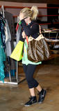 th_16938_celebrity_paradise.com_TheElder_AshleyTisdale2010_03_08_ShopsPlanetBlue7_122_111lo.jpg